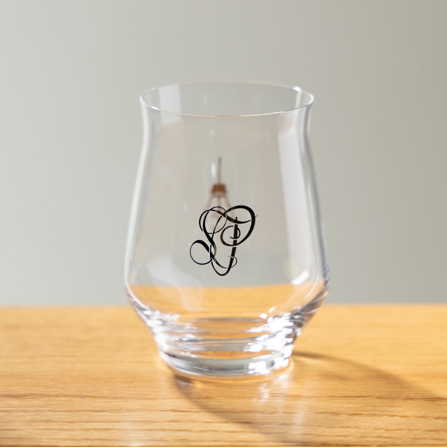 Light Bulb & "SP" Stemless Glass